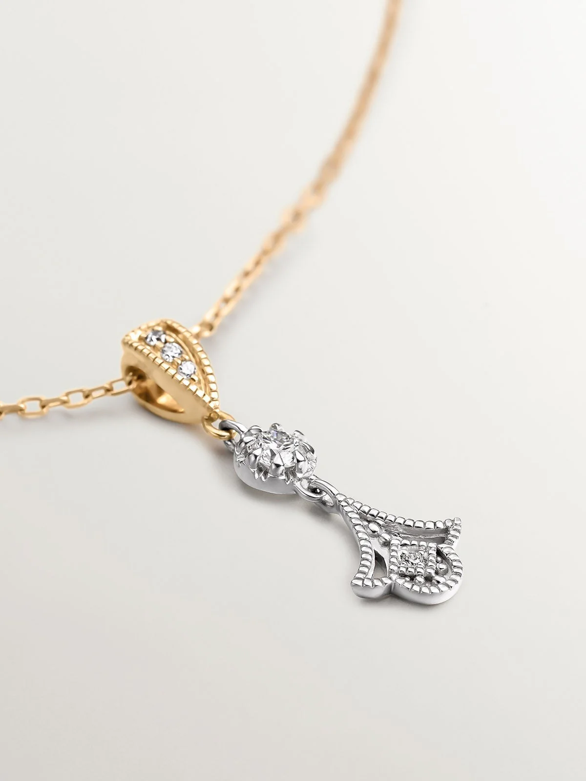 Colgante de oro blanco y amarillo de 18K con diamantes en talla brillante - Image 8